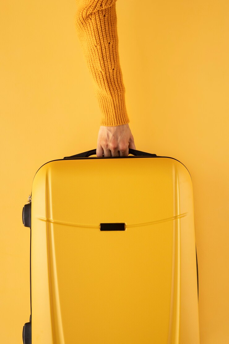 Photo gratuit valise de voyage et emballage des préparatifs