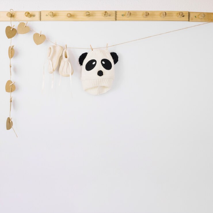 Photo gratuit vêtements de bébé sur la corde