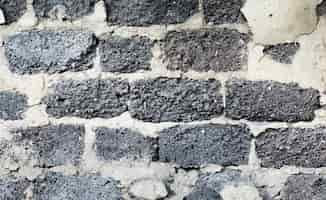 Photo gratuite vide vieux texture de mur de briques grises