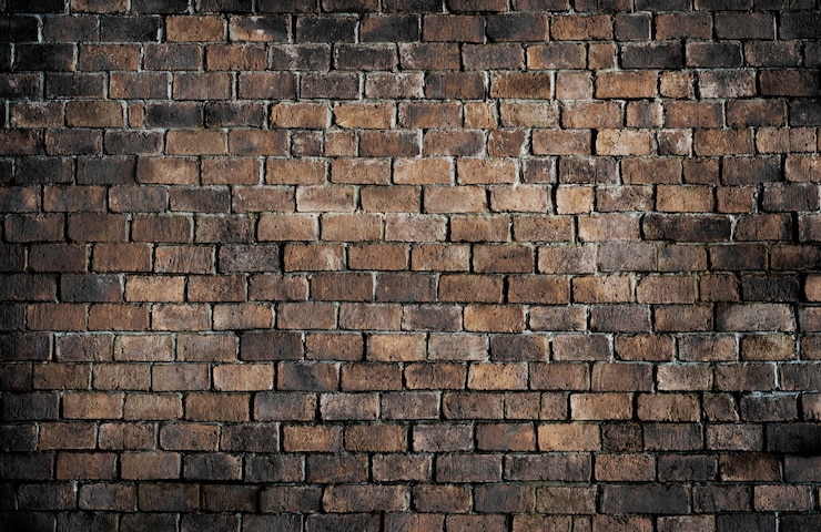 Photo gratuit vieux fond de mur de brique texturé