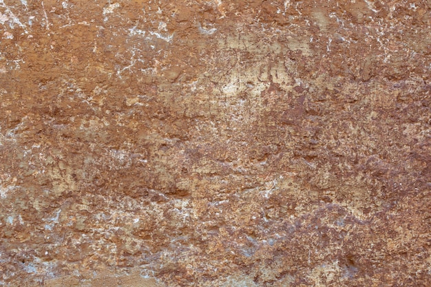 Vieux mur brun endommagé