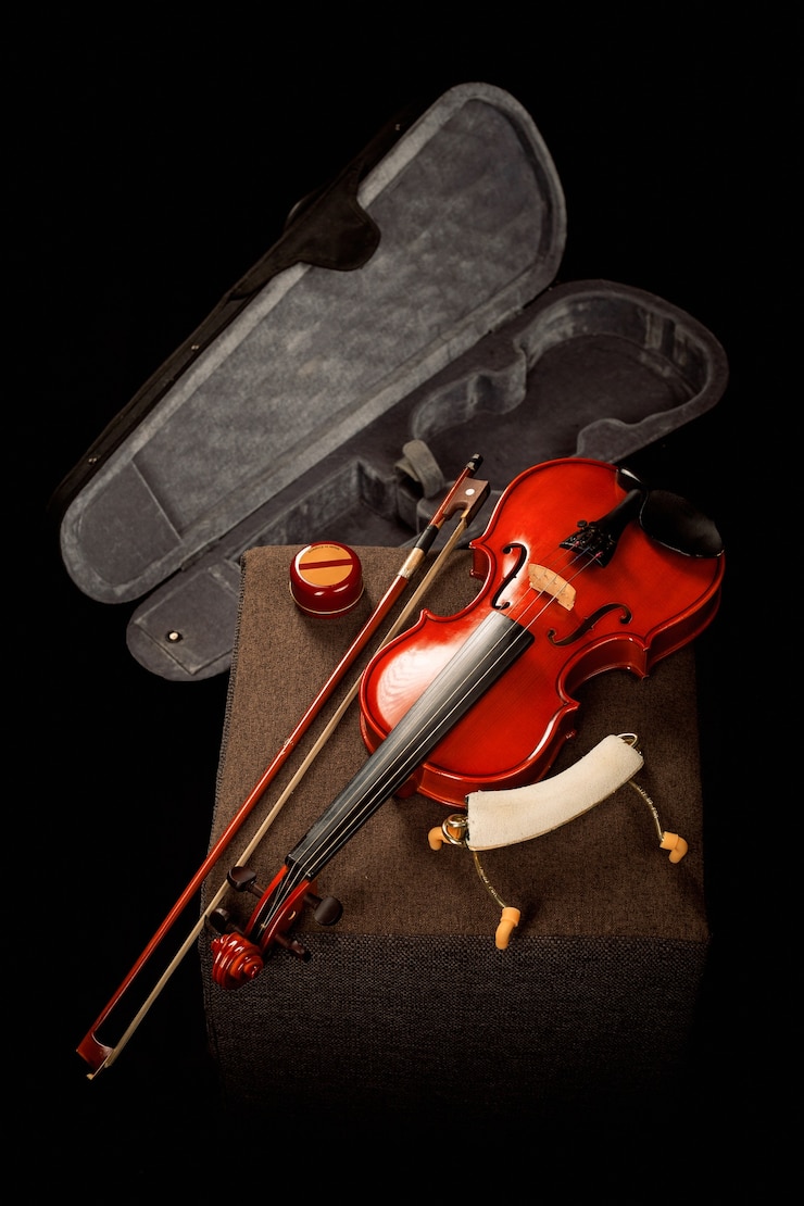 Photo gratuit violon sur sa boîte spéciale avec son archet