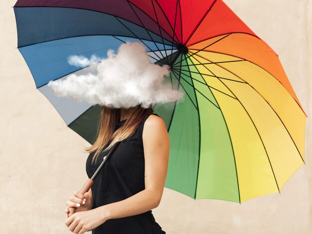 Vue côté, femme, tenue, parapluie