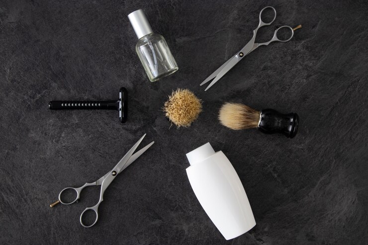 Photo gratuit vue de dessus de l'auto-soin masculin dans la nature morte