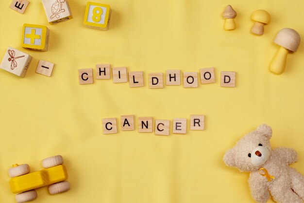 Vue de dessus sur le concept de fond du mois de sensibilisation au cancer chez les enfants,