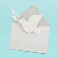Photo gratuite vue de dessus du papier colombe dans une enveloppe