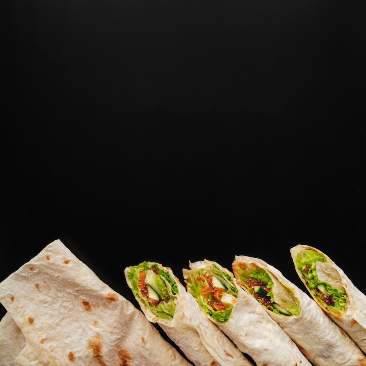 Photo gratuit vue de dessus des enveloppements de burrito avec espace copie