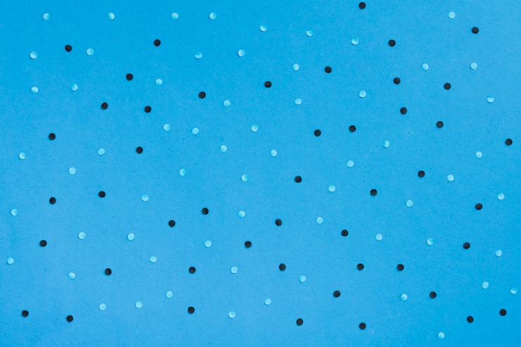 Photo gratuit vue de dessus fond bleu avec des points