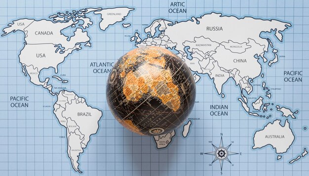 Vue de dessus globe et carte du monde