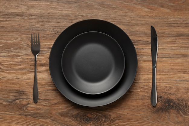 Photo gratuite vue de dessus des tables à manger sans nourriture