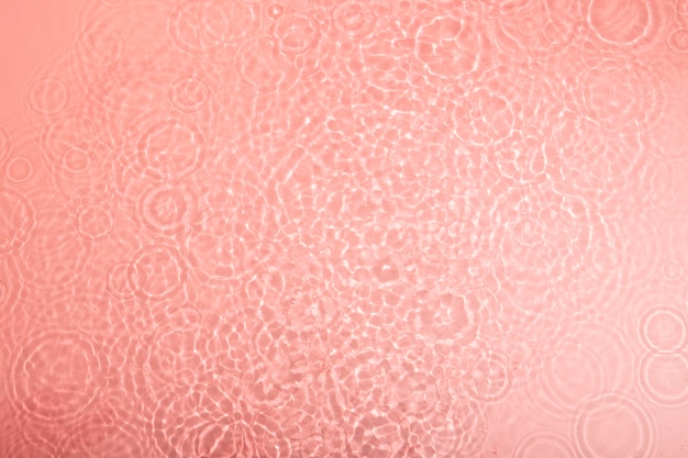 Vue de dessus de la texture de l'eau sur rose