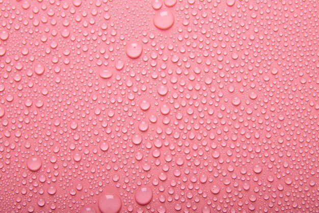 Vue de dessus de la texture de l'eau sur rose