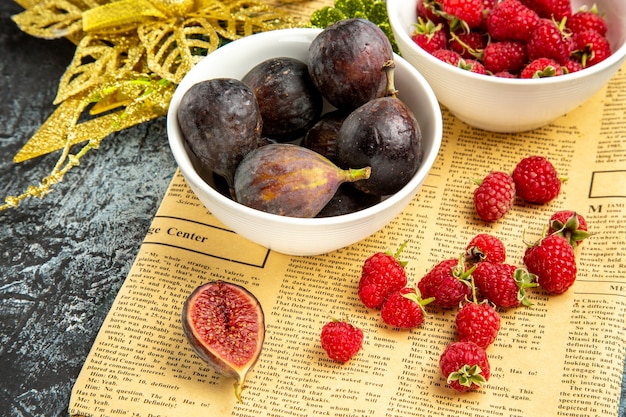 Vue de face framboises fraîches aux figues