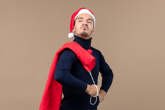 Vue De Face Jeune Homme Avec Une Expression Confiante, Vacances De Noël Santa