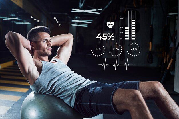 Vue latérale homme faisant du sport avec des statistiques