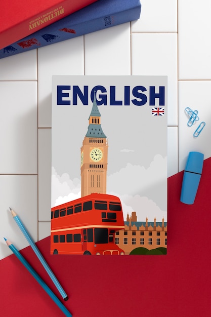 Vue supérieure livre et crayons en anglais