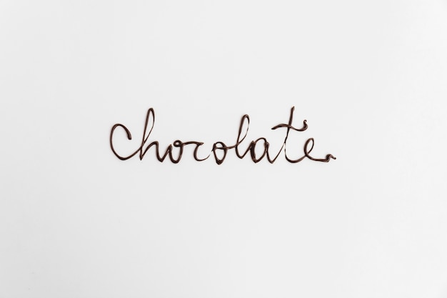 Photo gratuite word chocolat écrit par chocolat fondu