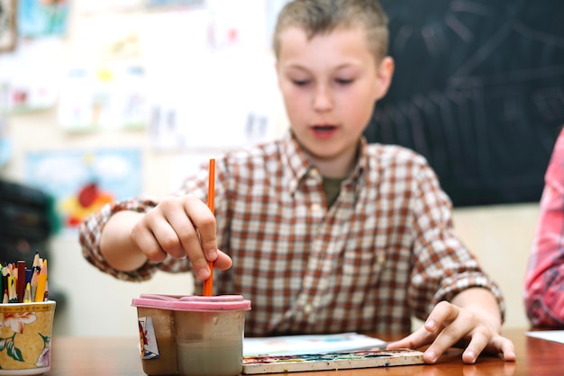 Youngster on drawing lesson