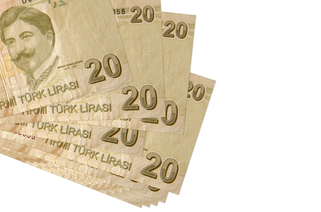20 billets de lires turques se trouvent en petit groupe ou pack isolé sur blanc. Concept d'entreprise et d'échange de devises
