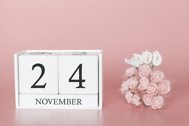 24 novembre cube de calendrier sur mur rose