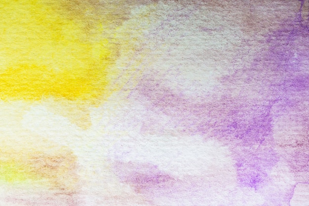 abstrait aquarelle jaune et violet. peinture à la main