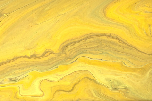 Abstrait art fluide fond clair couleurs dorées et jaunes Marbre liquide Peinture acrylique avec dégradé et éclaboussures Toile de fond aquarelle avec motif ondulé Section marbrée en pierre