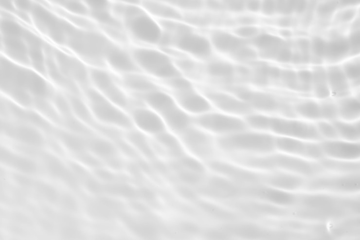 Photo abstrait blanc transparent ombre d'eau texture de surface fond ondulé naturel