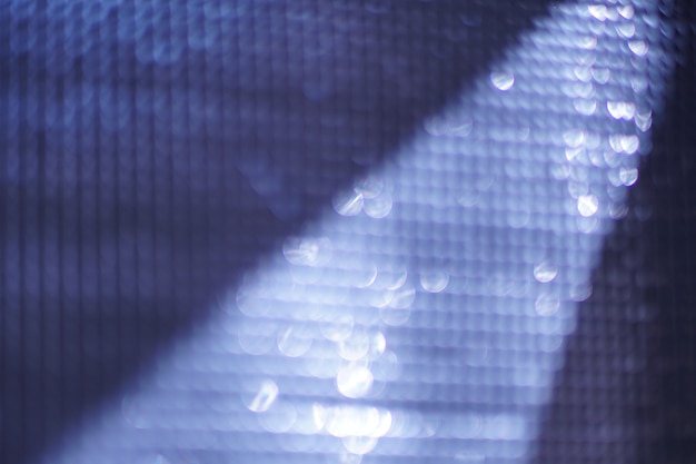 Abstrait bokeh circulaire bleu doux.