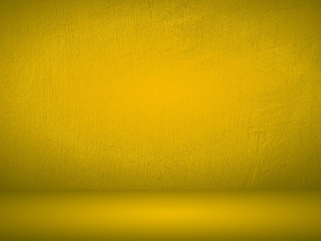 Abstrait jaune avec dégradé lisse utilisé pour la salle de studio de produit de modèles de conception web