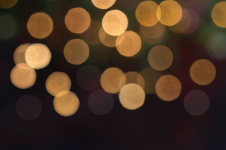 Photo abstrait lumière bokeh, lumières de noël, lumières floues, éclat de paillettes