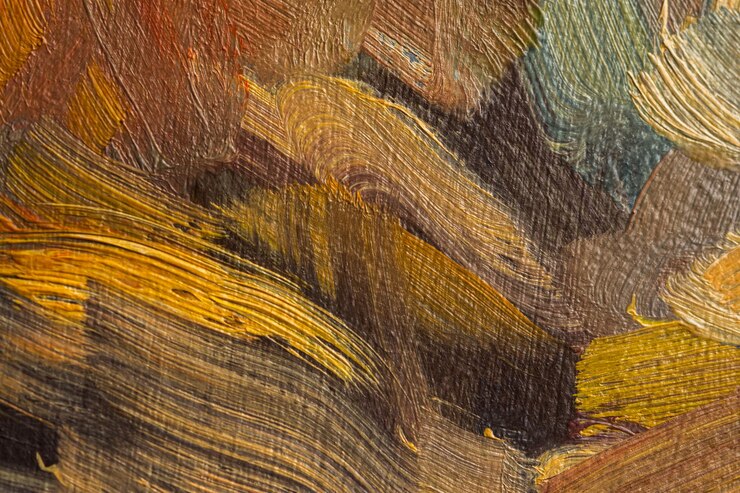 Photo abstrait multicolore avec de la peinture à l'huile. fond texturé à la main pour la signalisation et les bannières. un mélange de couleurs marron, rouge, beige sable, jaune et chocolat sur toile. contexte artistique coloré.
