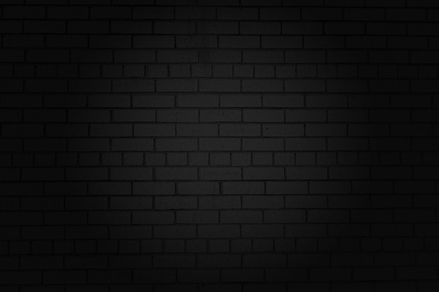 Photo abstrait d'un mur de briques noires