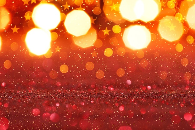 Abstrait paillettes rouges avec des lumières dorées