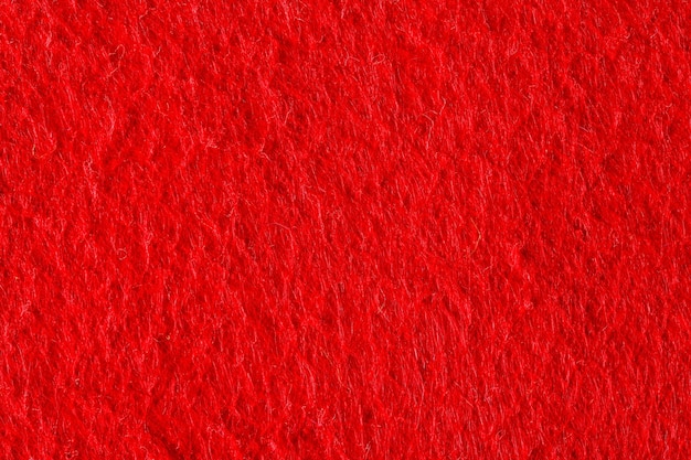 Abstrait avec texture feutre rouge, tissu velours. Photo macro haute résolution.