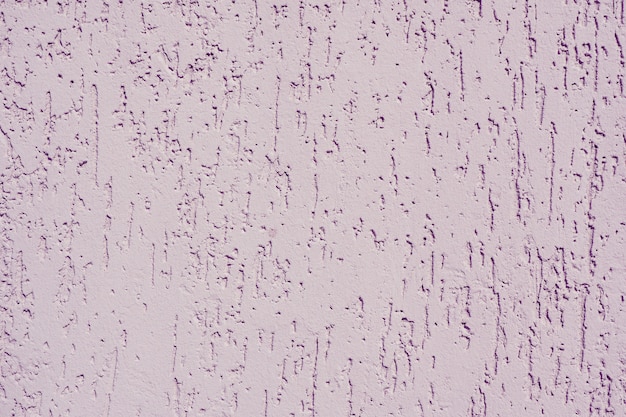 Abstrait et la texture d'un mur de plâtre lilas avec la texture du dendroctone du chêne.