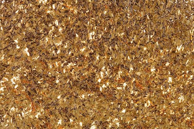 Abstrait de texture de paillettes dorées sur macro