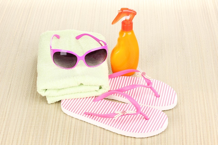 Photo accessoires de plage sur tapis