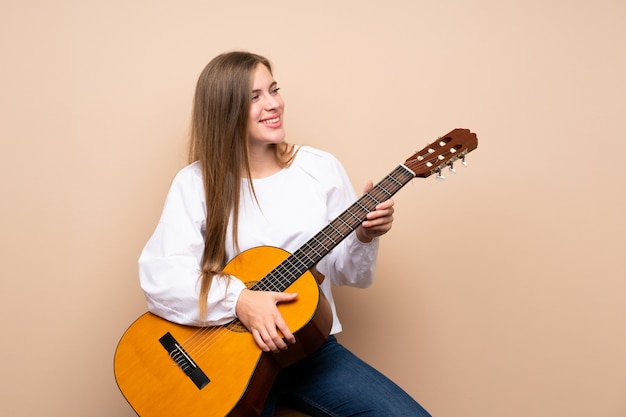 Adolescente avec guitare