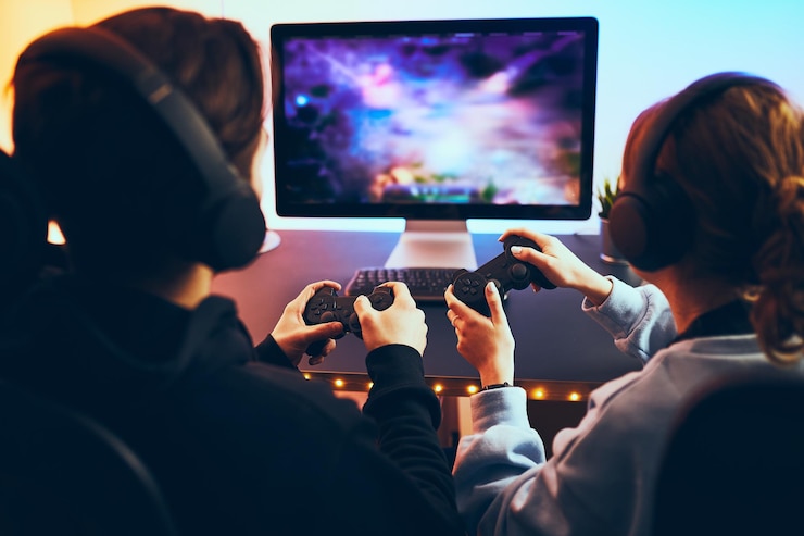Photo des adolescents jouent à des jeux vidéo, à des compétitions, à des tournois, à des championnats.