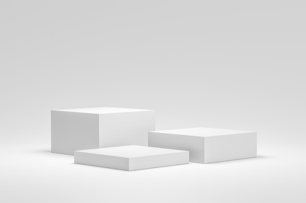 Affichage du podium ou du piédestal vide sur fond blanc avec le concept de stand de boîte.