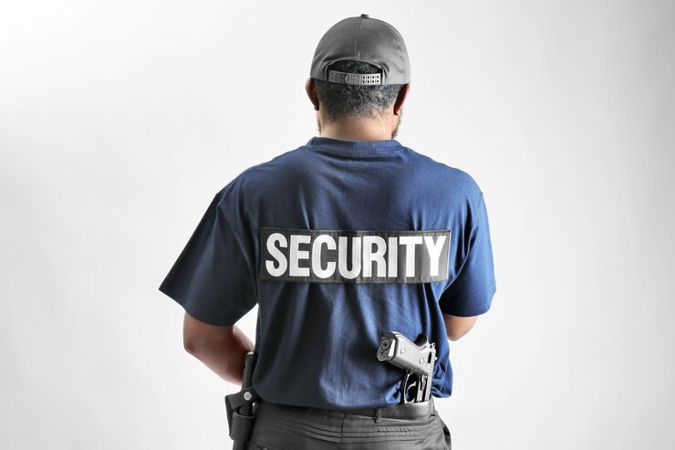 Photo agent de sécurité masculin sur fond clair