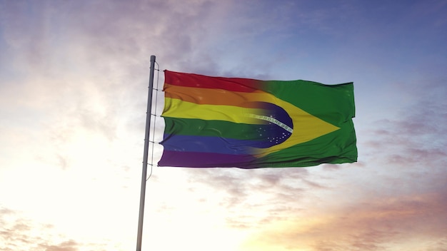 Agitant le drapeau national du Brésil et fond de drapeau arc-en-ciel LGBT