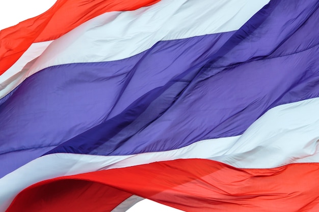 Agitant le drapeau de la Thaïlande sur fond blanc