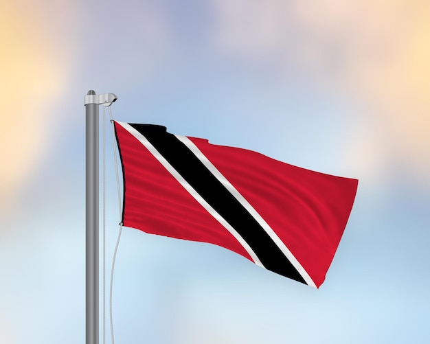 Photo agitant le drapeau de trinité-et-tobago sur un mât de drapeau