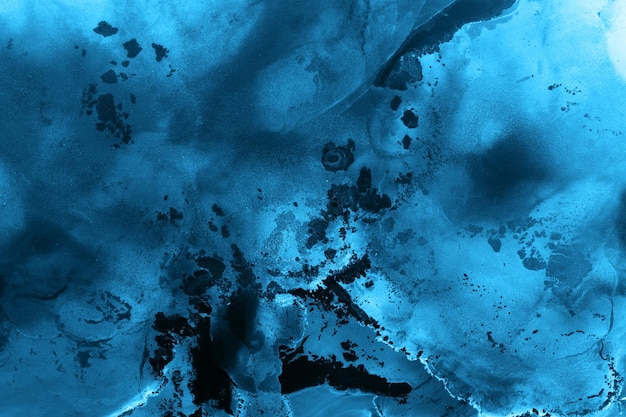 Alcool encre fond abstrait bleu noir océan vagues peinture acrylique motif tourbillon de mer taches et taches
