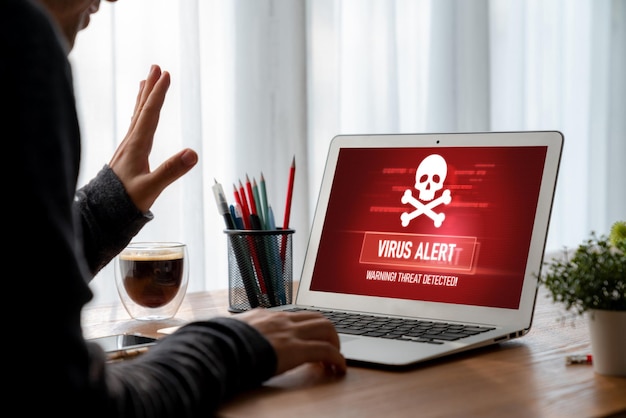 Photo alerte d'avertissement de virus sur l'écran de l'ordinateur détecté menace informatique moderne hacker virus informatique et logiciels malveillants