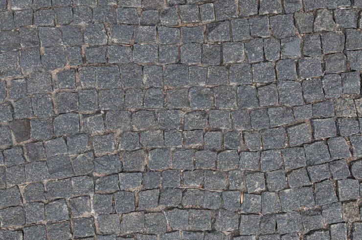 Allée à plat pavée de granit gris