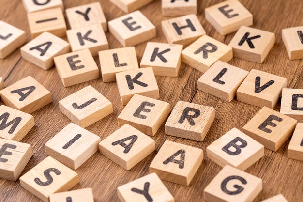 Photo alphabets sur des cubes de bois comme arrière-plan