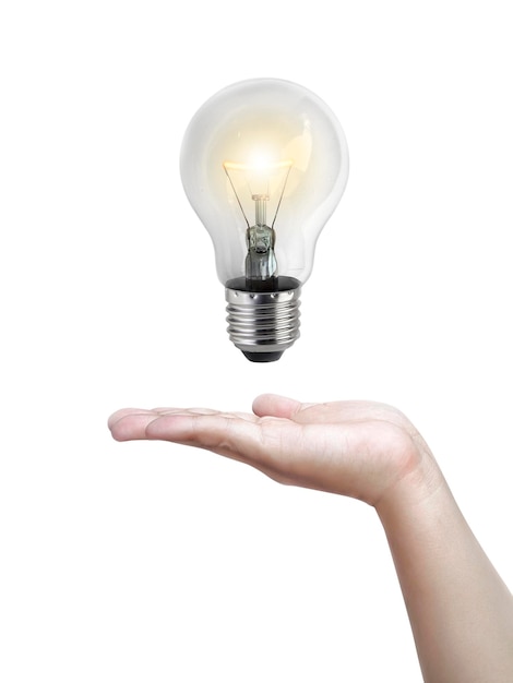 Ampoule dans la mainImage photo réaliste Allumer l'ampoule au tungstène avec la main isolée sur fond blanc