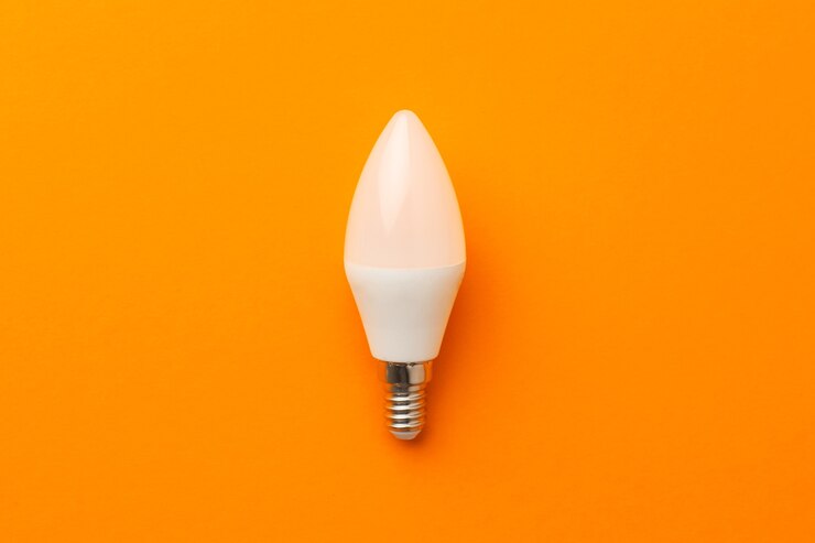 Photo ampoule sur orange vif